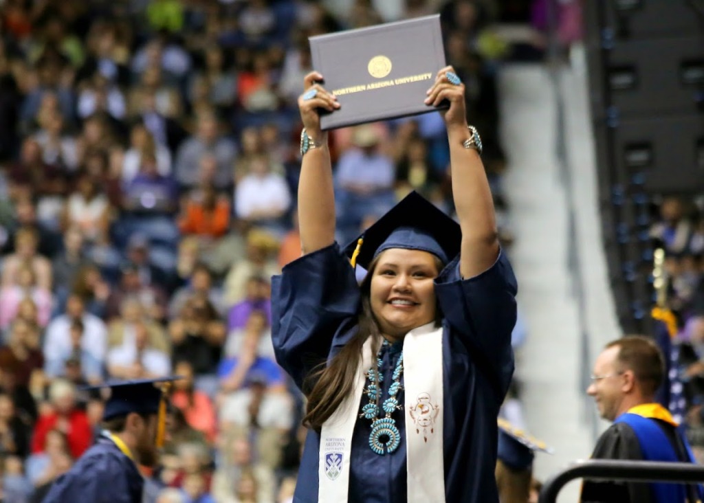 Native American grad raises degree