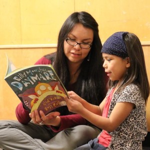 Natasha Fulton, Gates Scholar, reads to a kindergarten student