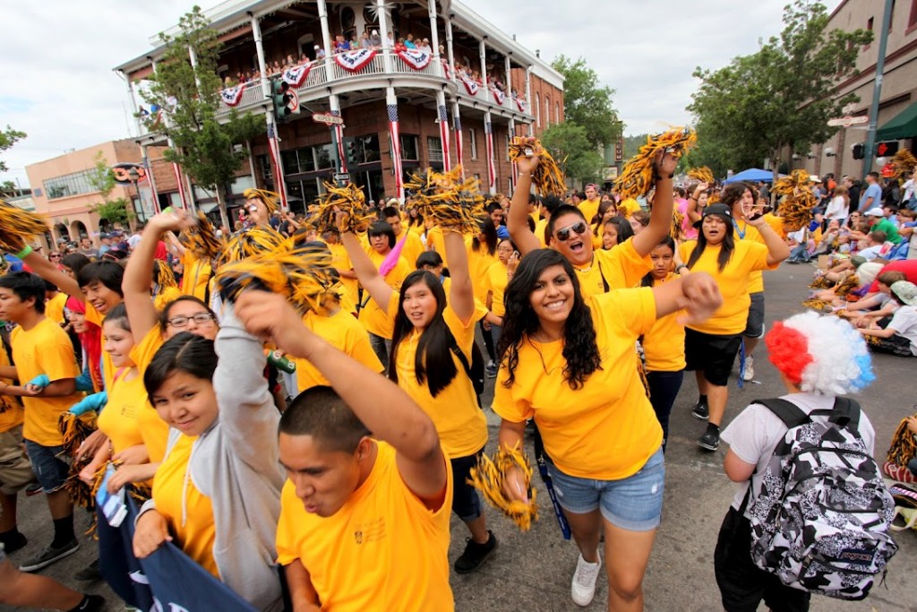Students wear gold in parade, show pride