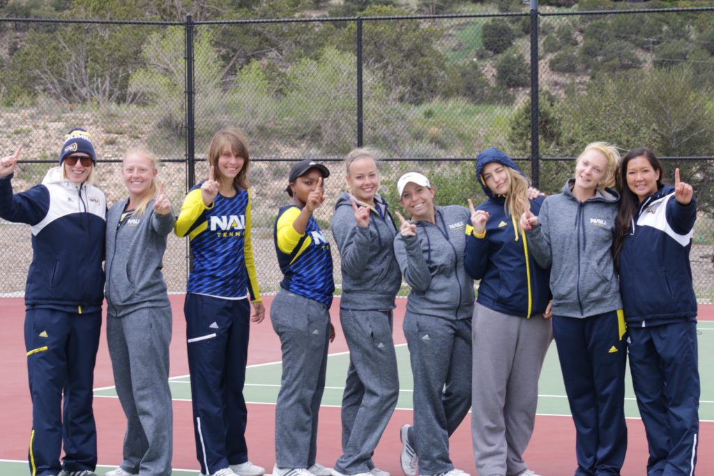 Women's tennis members on the court