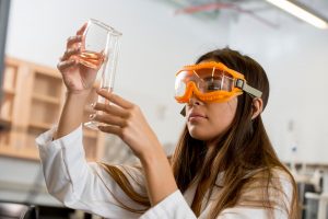 Female NAU student working in chemistry lab