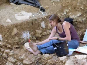Chrissina Burke at excavation site in France