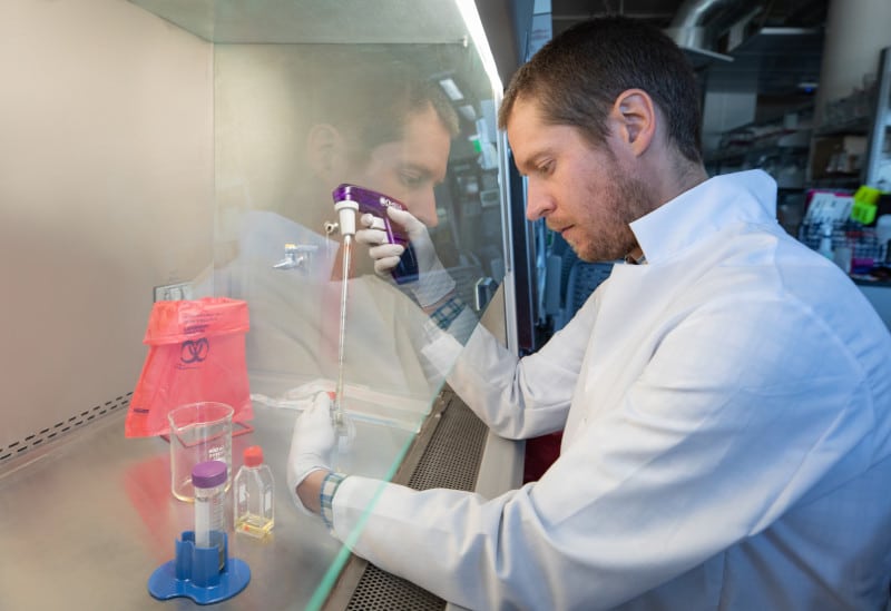 Jason Ladner does research in his lab
