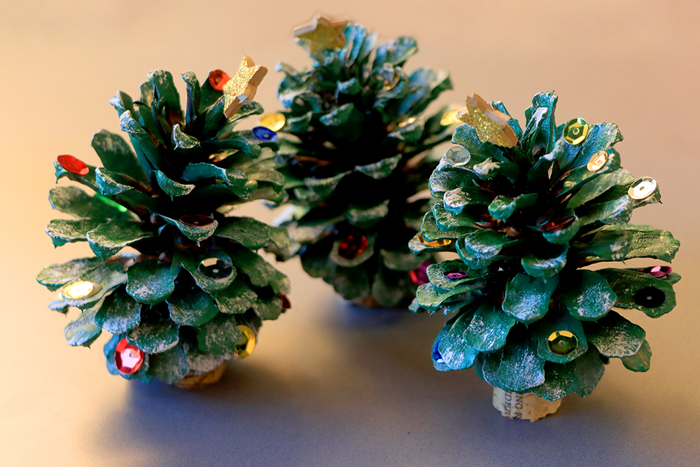 Three pinecone Christmas trees