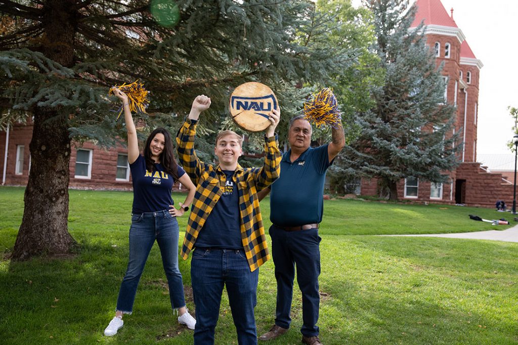 Lumberjacks in blue and gold with a wood cookie