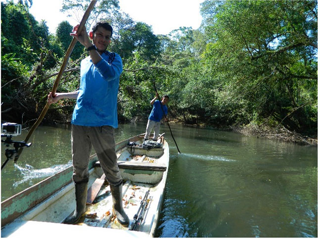 José Martinez-Fonseca on a canoe on a Nicaraguan river