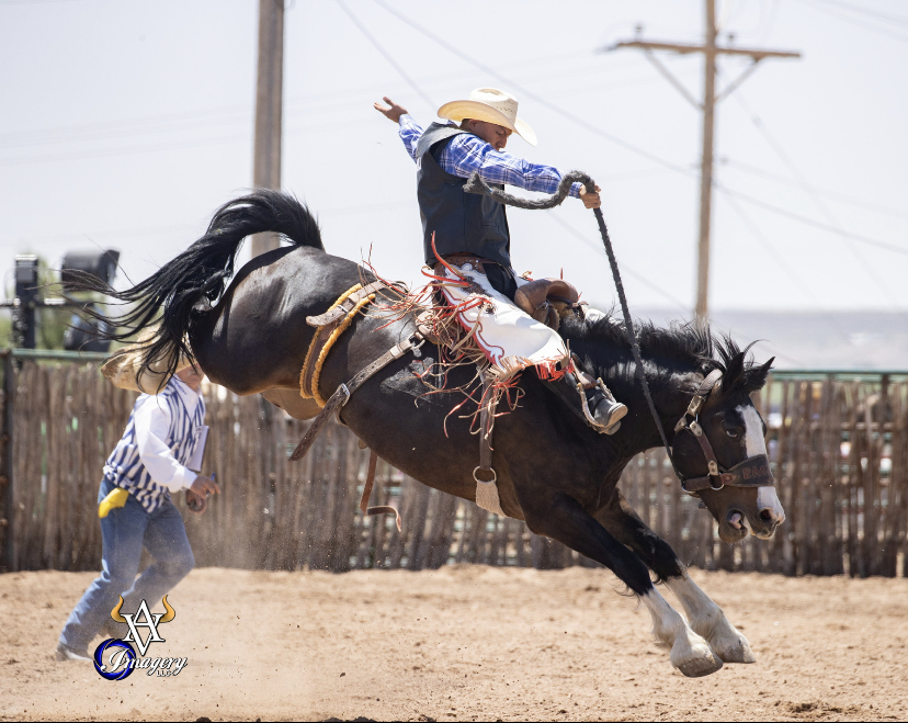Stade Riggs event of Saddle Bronc Riding in one photo at the Las Cruces college rodeo
