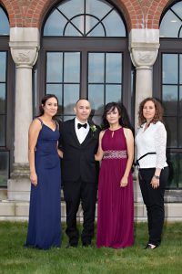 Esther Cuellar and three other people in formalwear