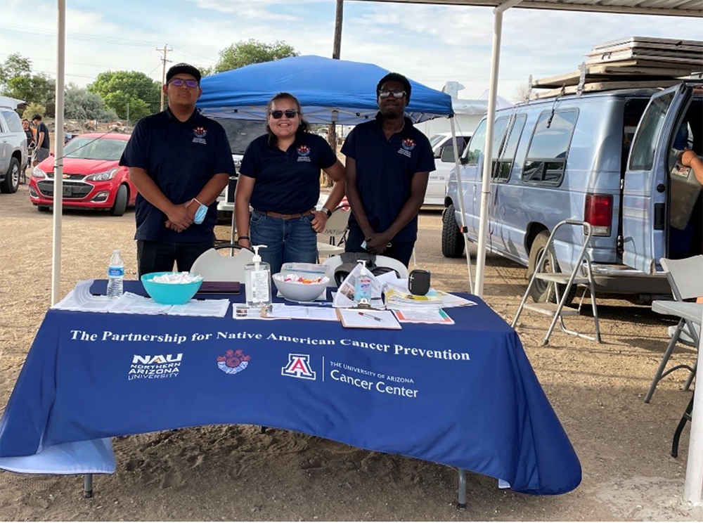 Members of the Navajo Healthy Stomach team present at a flea market in Shiprock, NM.