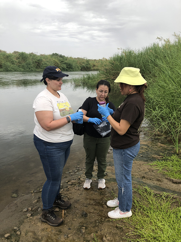 Maddy Molzahn, Jenessa Arviso, and Karis Black collect water samples on the Cocopah Reservation