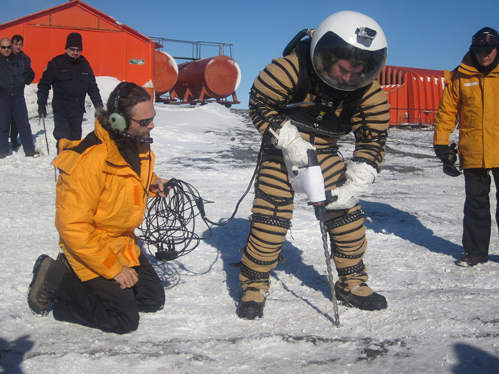 Space suit designer and co-author Pablo de Leon testing the NDX-3 Planetary Space Suit in Antarctica. Development of drilling and excavation tools will be of critical importance for research, habitation, and rescue operations in planetary caves. Photo credit: Human Spaceflight Laboratory, University of North Dakota.