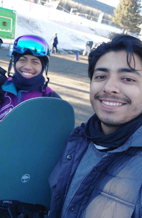 Valentin and a friend with snowboards at Snowbowl