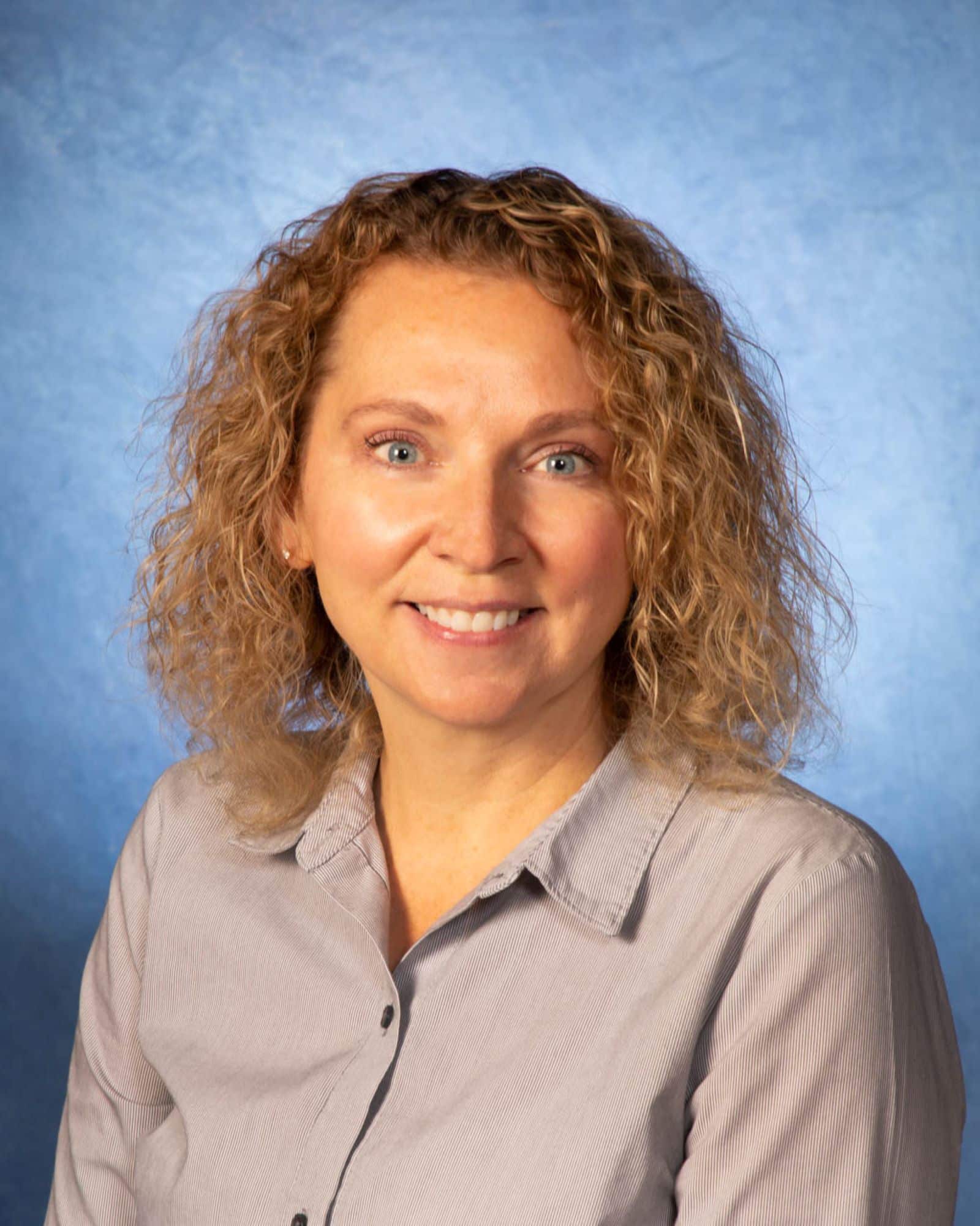 portrait photo of Nancy Baca- associate teaching professor of Economics and Interim Director for the Economic Policy Institute at the W.A. Franke College of Business.