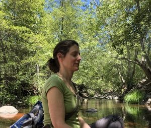 Janine Schipper meditating in nature