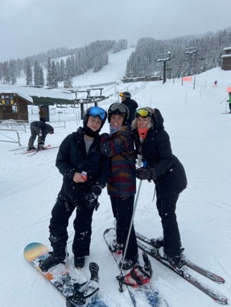 ARmstrong-Heimsoth skiing with her sons