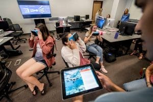 Ed tech students use technology to learn