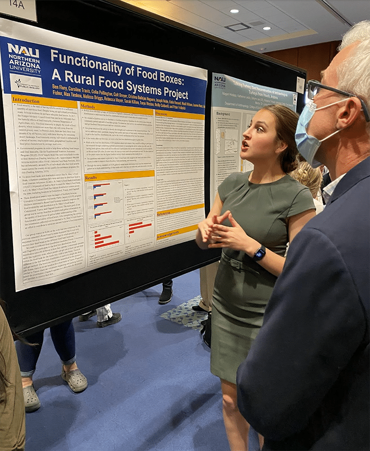 Melissa Briggs explains her research at the 2022 Undergrad Symposium