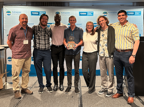 Grier (third from left) poses with his NAU team after placing third in the Hydropower Collegiate National Competition.