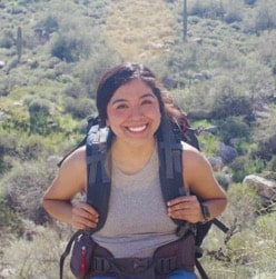 Adriana Garcia-Rivera backpacks in desert