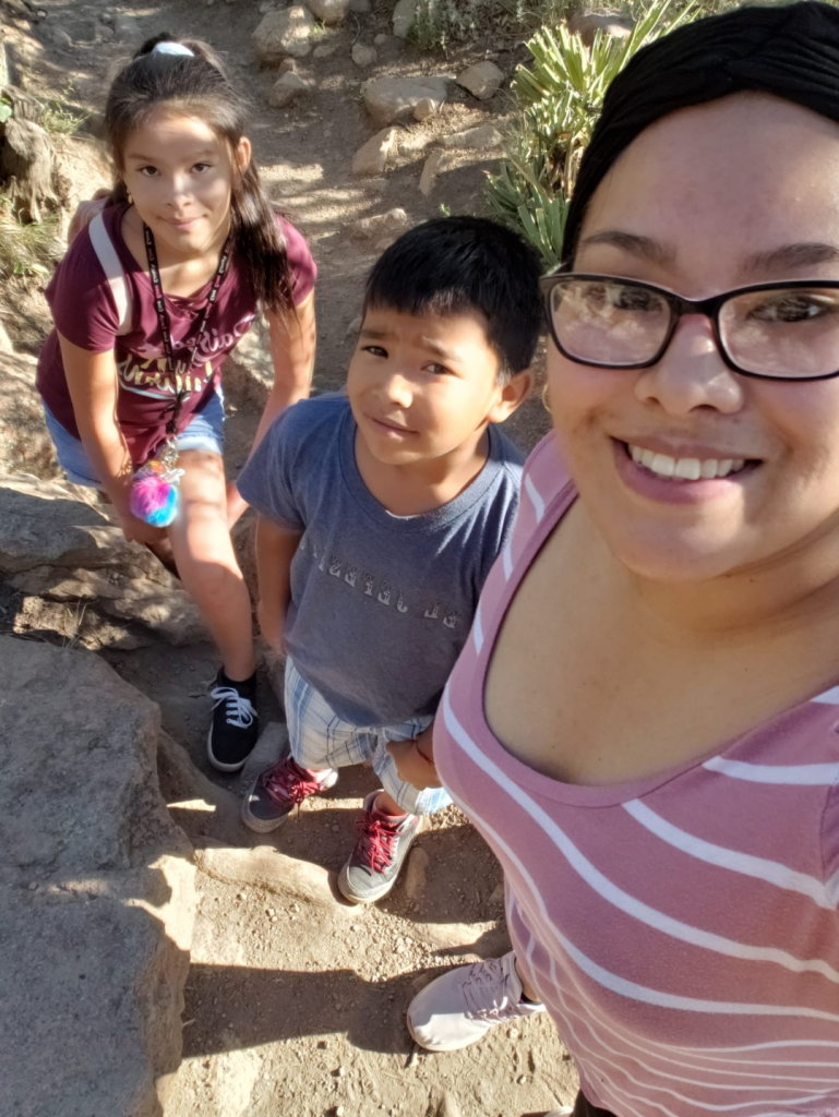 Haida Tafolla and her family hiking