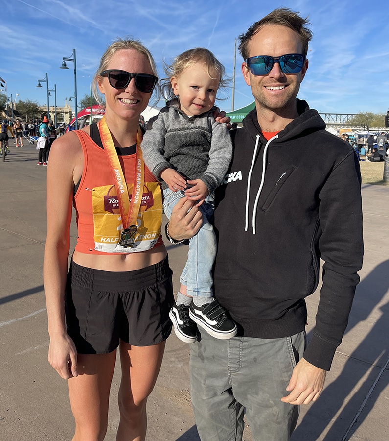 Emily, Matt and their son after a race.