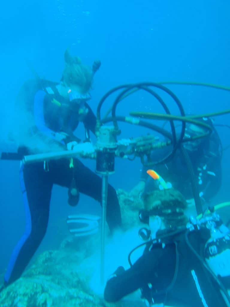 Diane Thompson from the University of Arizona drills corals in the Galapagos Islands.