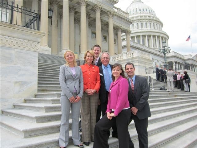 John Heick with Rep. Gabby Gibbords and others on the steps of the U.S. Capitol