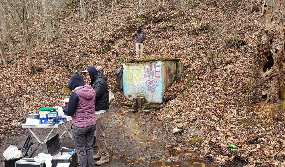 Students and professors work at Dry Run Spring in West Virginia
