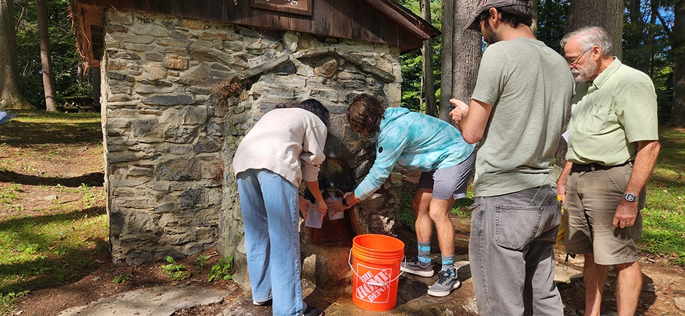 Students and professors work at Orenda Spring in Saratoga Spa Springs State Park in New York.