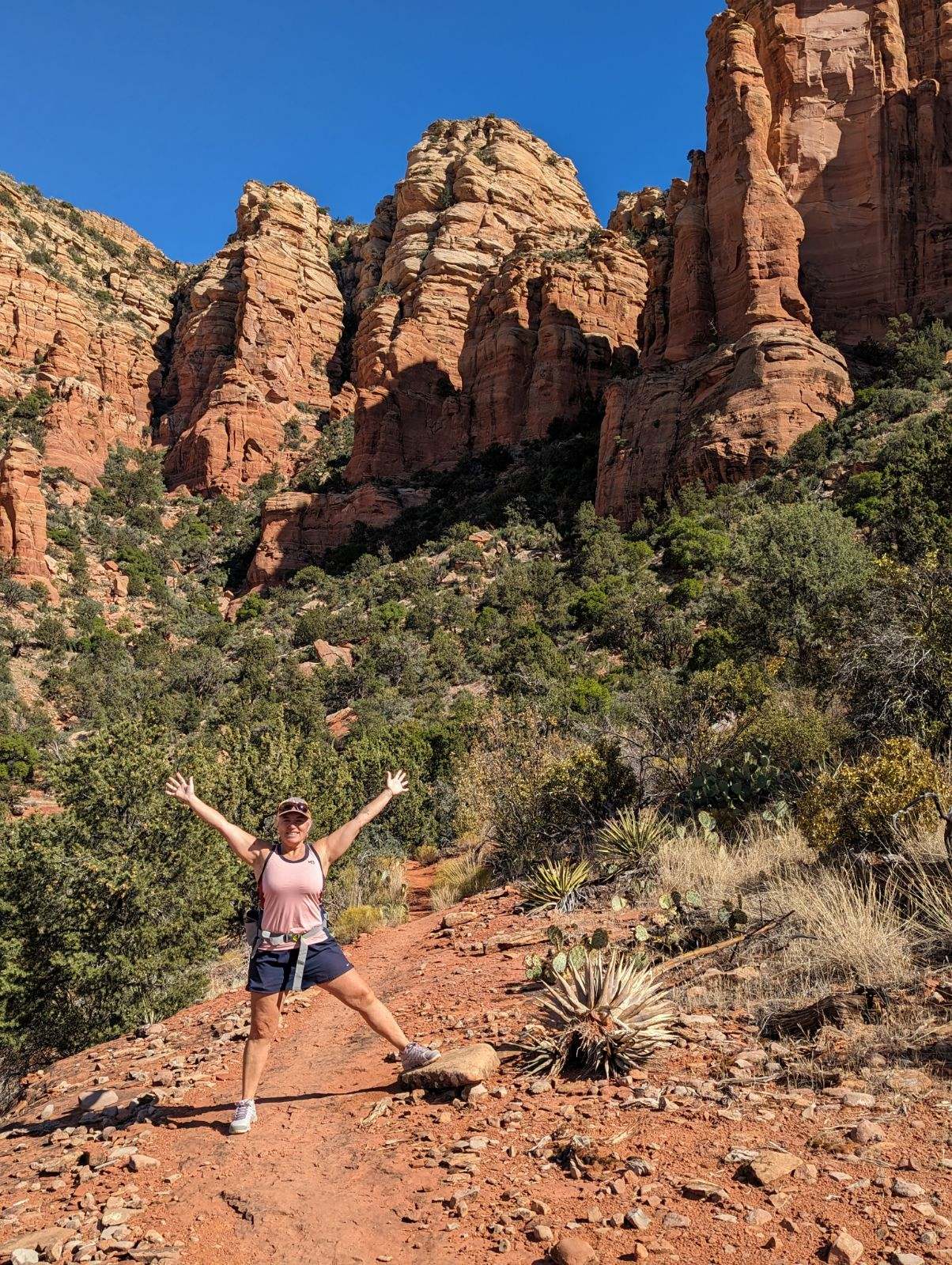 Emy Tice hiking in the red rocks in Sedona.