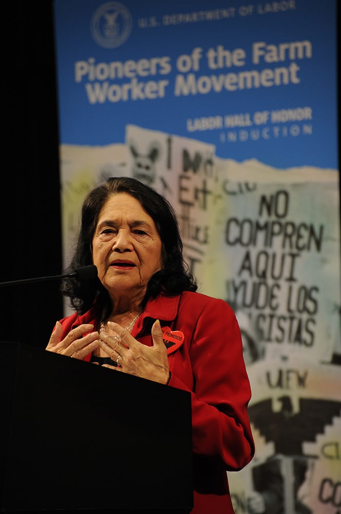 Dolores Huerta speaking at a Department of Labor event,