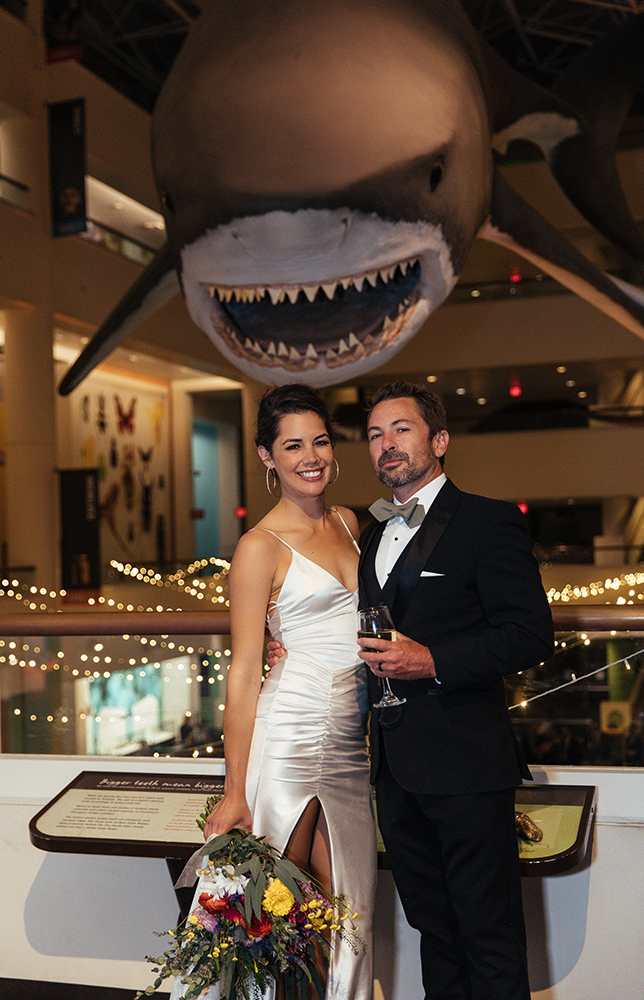 Claudia Iglesias-Buck and her husband, Travis, on their wedding day.