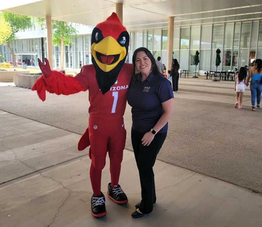 Marcy Hurtado with the Arizona Cardinal mascot.
