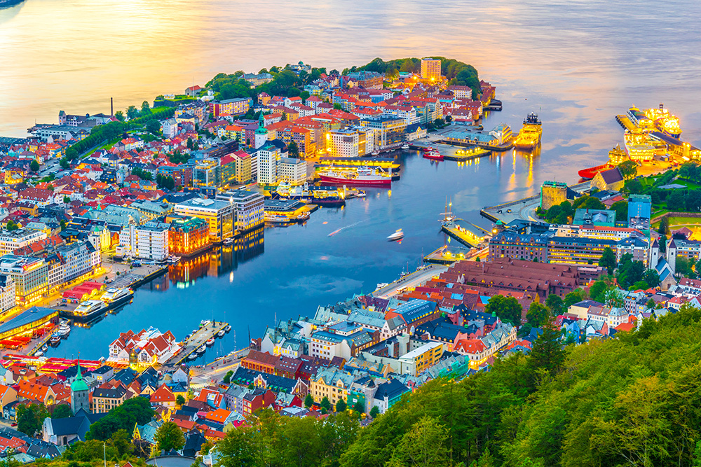 Sunset view on Bergen and harbor from the mountain floyen