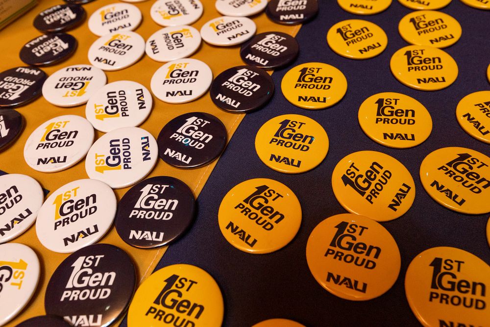 A table of buttons that say "First-Gen Proud" in NAU colors