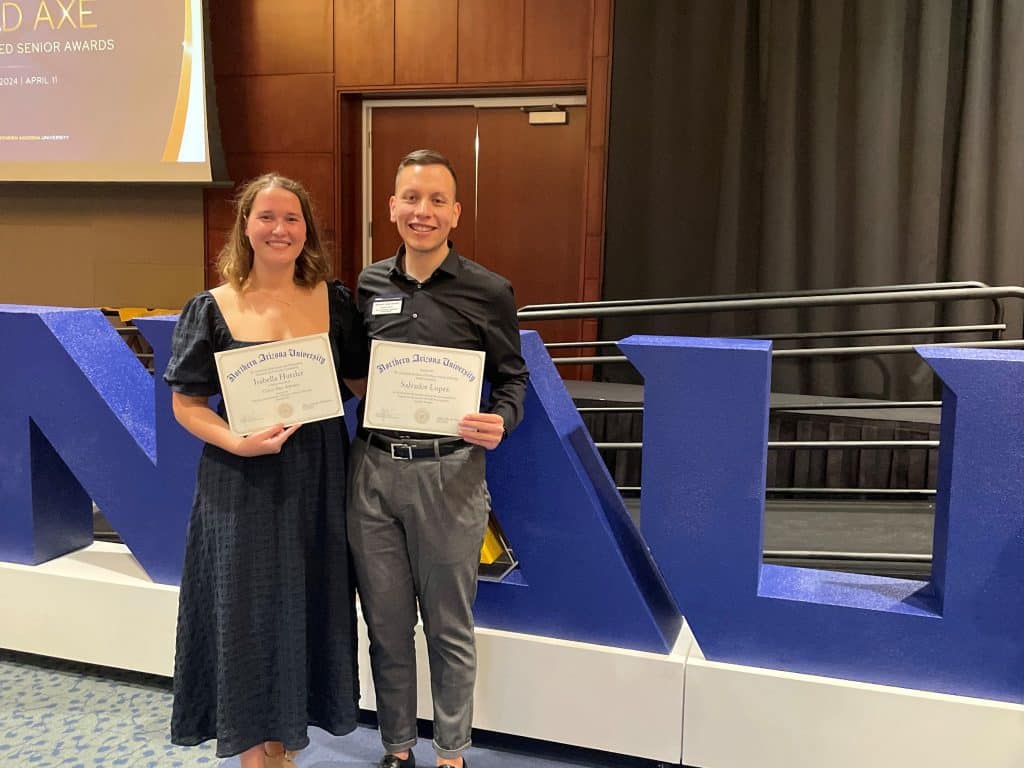 Salvador Lopez and a student who named his as an educator of influence.