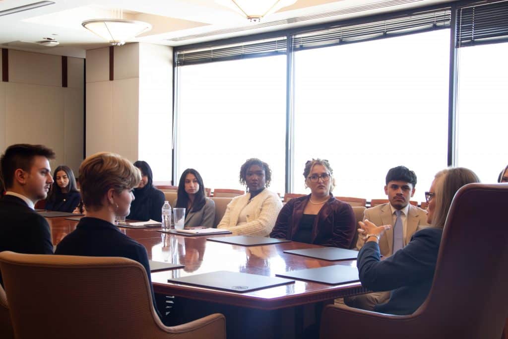 People sitting around a table with Gov. Katie Hobbs