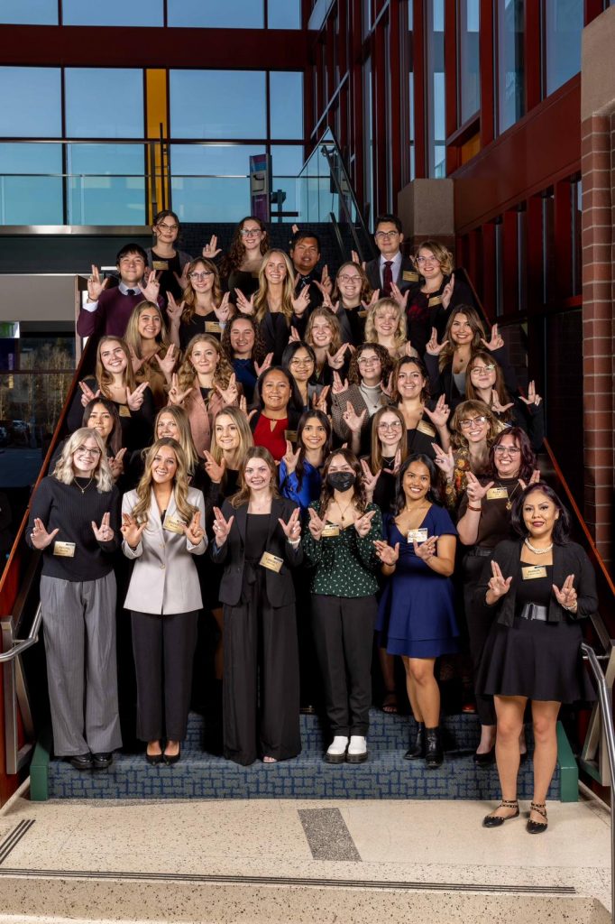 Gold Axe and Distinguished Senior winners on the stairs