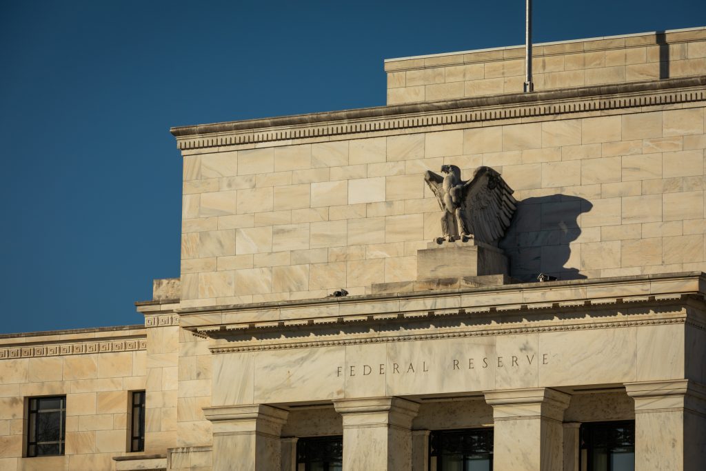 Exterior of the Federal Reserve building at golden hour