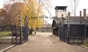 Entrance to a Nazi death camp with iron Arbeit Macht Frei sign