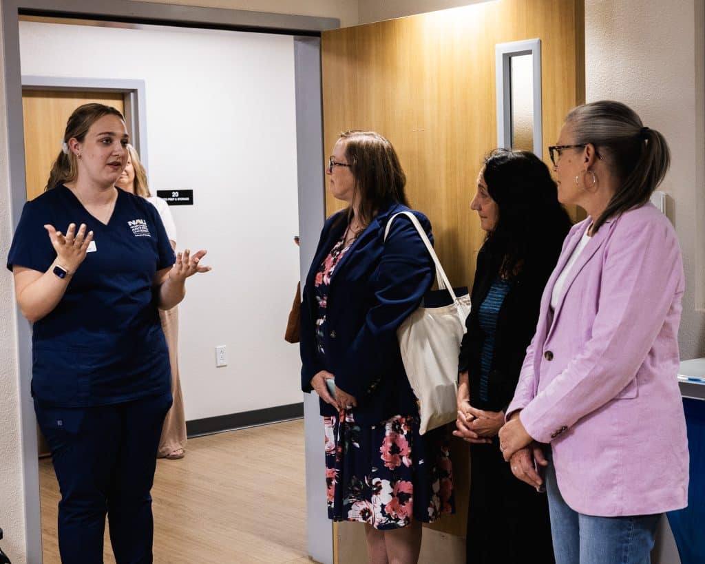 Gov. Hobbs with a NAU nursing student in the nursing simulation lab
