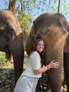 Ashlyn Ruby posing with an elephant