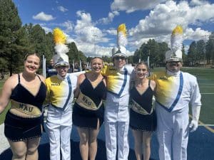Six members of the Lumberjack Marching Band