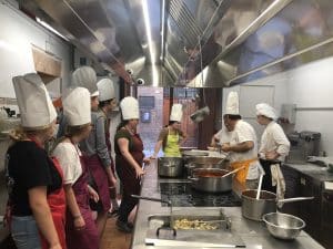 NAU students in Italy learning from to cook