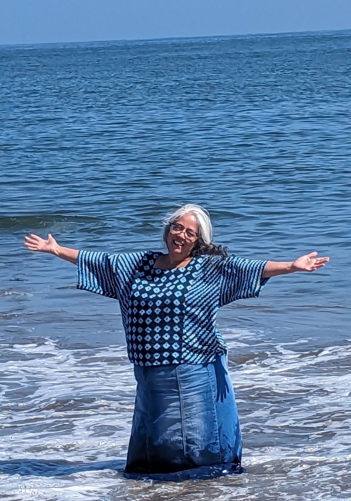 Teresa Marrufo standing in the ocean