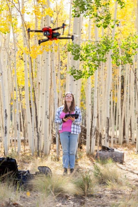 Alyssa Sanderson piloting UAS “Smokey” in the field.