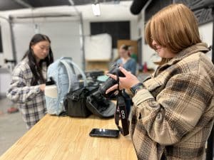 Student looking at a camera