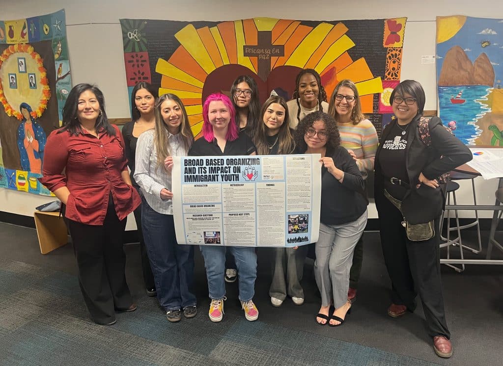 NAU students holding a poster during the Fall 2026 IYE presentations