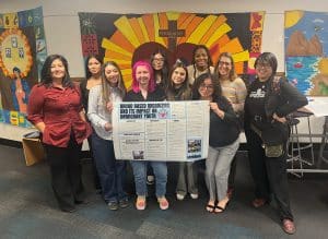 NAU students holding a poster during the Fall 2026 IYE presentations